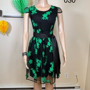 Black Dress with Green Floral Appliqué - Elegant Fit & Flare